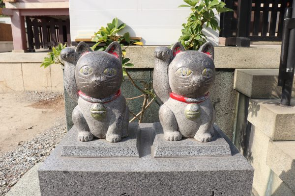 Imado shrine couple lucky cat stone zoom in Asakusa Japan